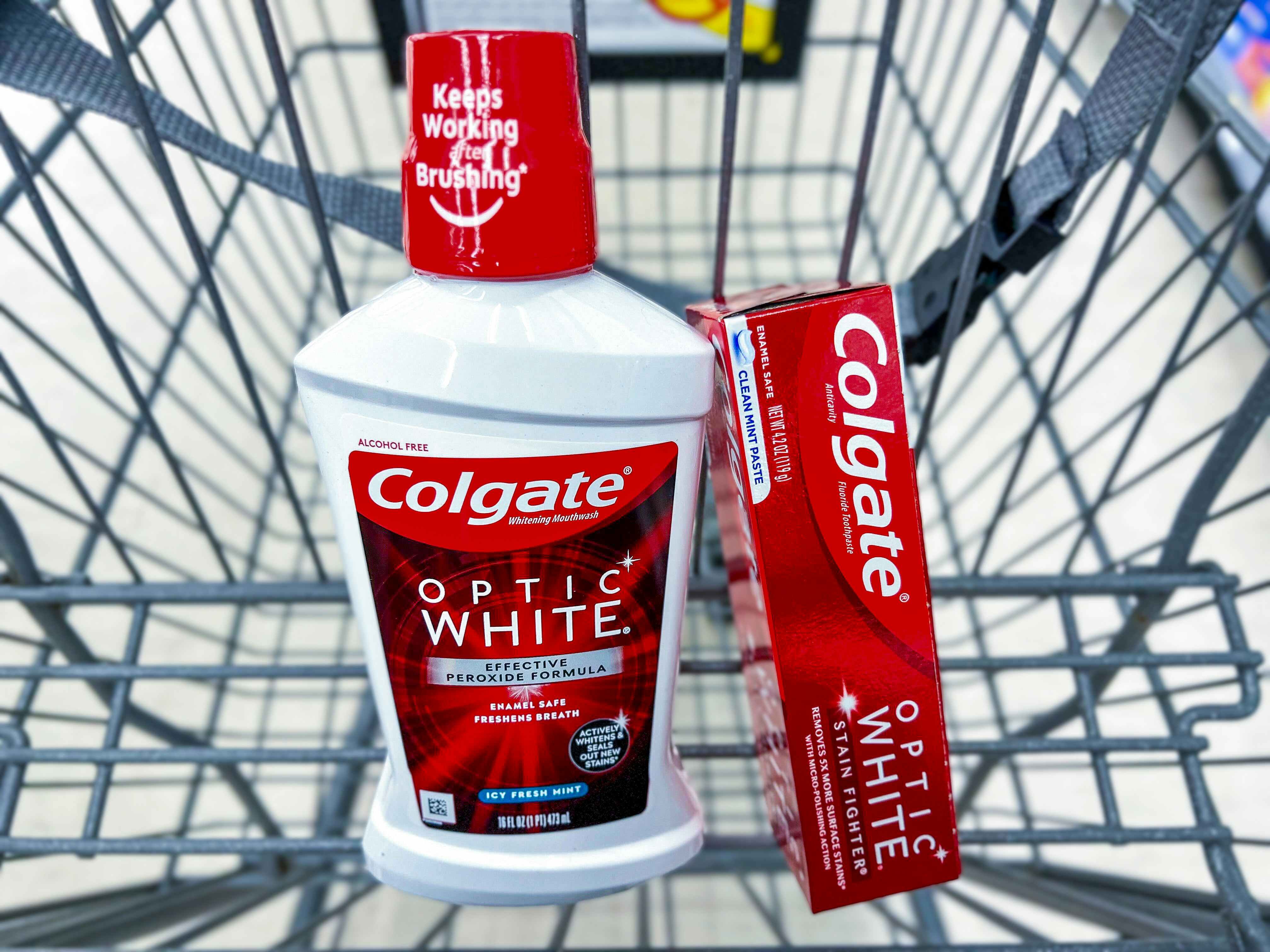 a tube of colgate toothpaste and a bottle of colgate mouthwash