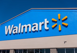 the front entrance sign of a Walmart store