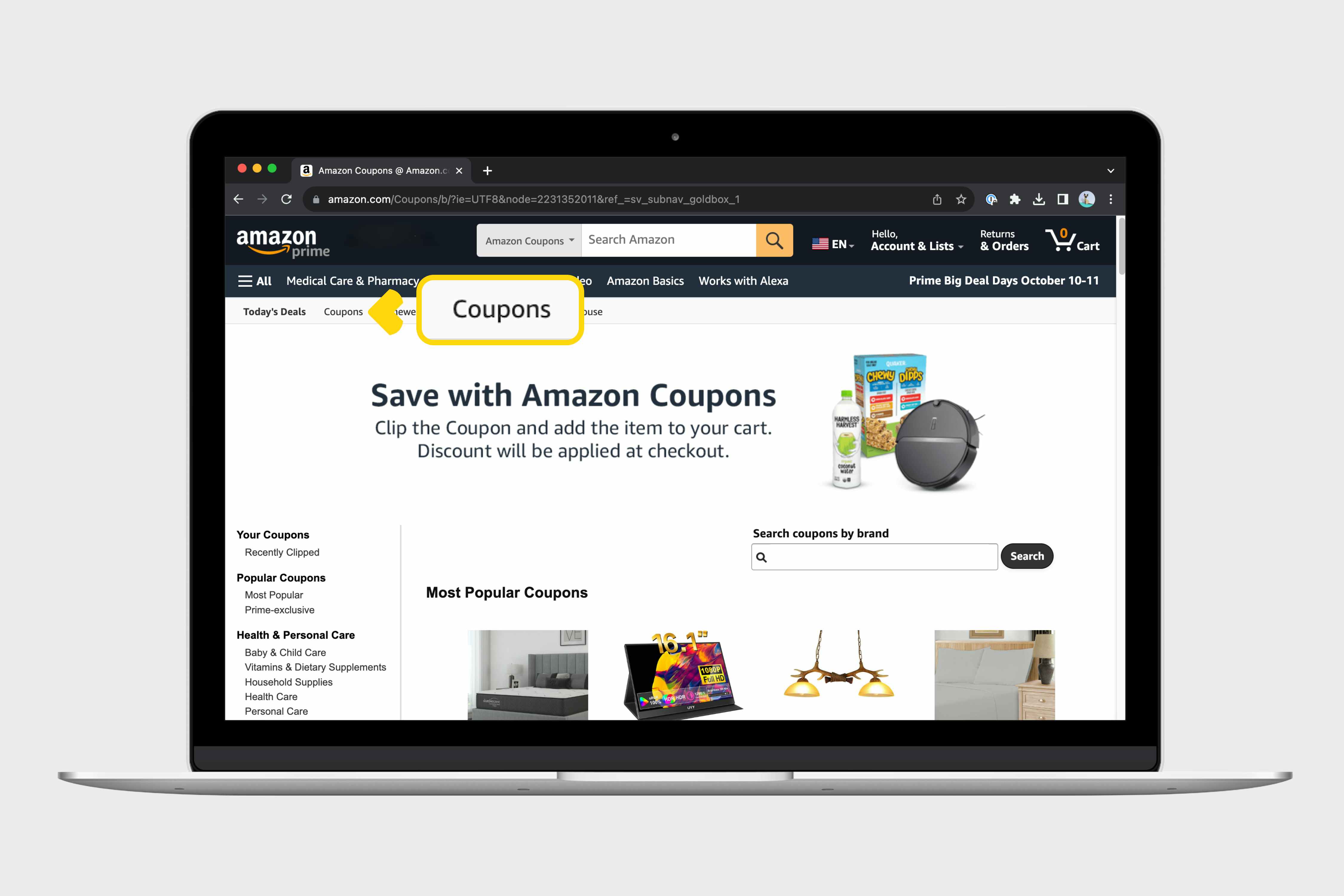 a laptop showing where the Coupons button is on the amazon deals page