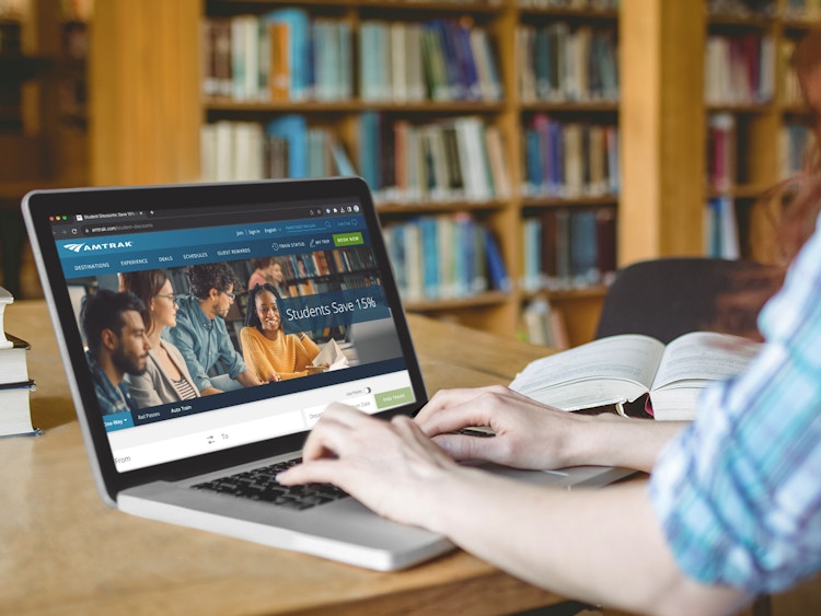 someone looking up the student discount on the Amtrak website