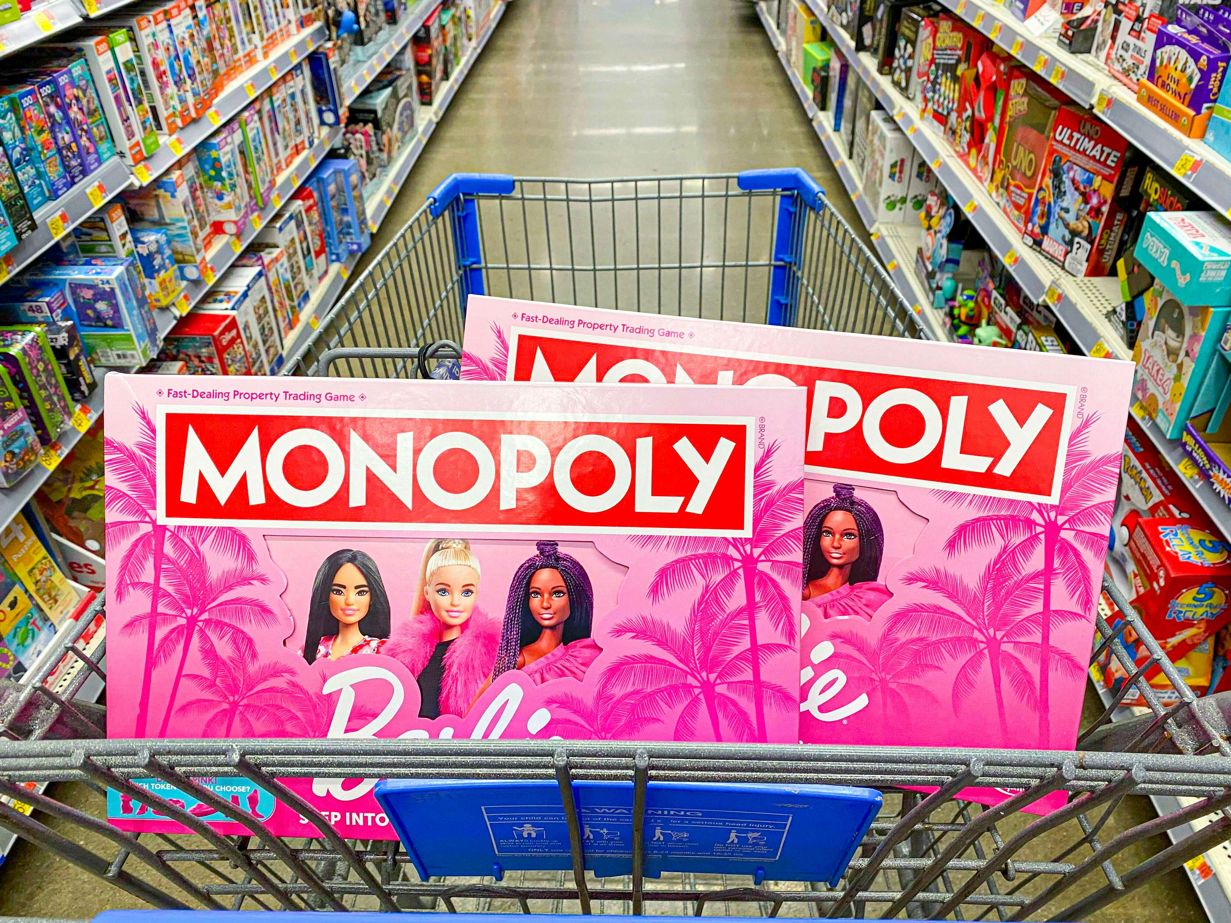 Two boxes of Barbie Monopoly 
