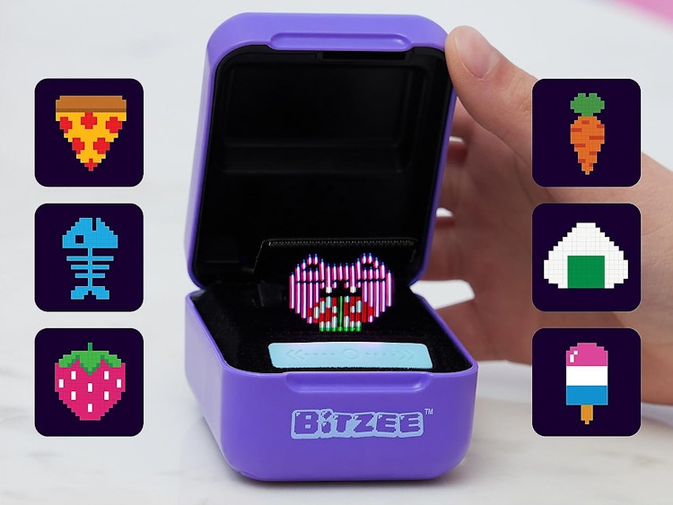 someone opening ip a Bitzee digital pet with food icons 