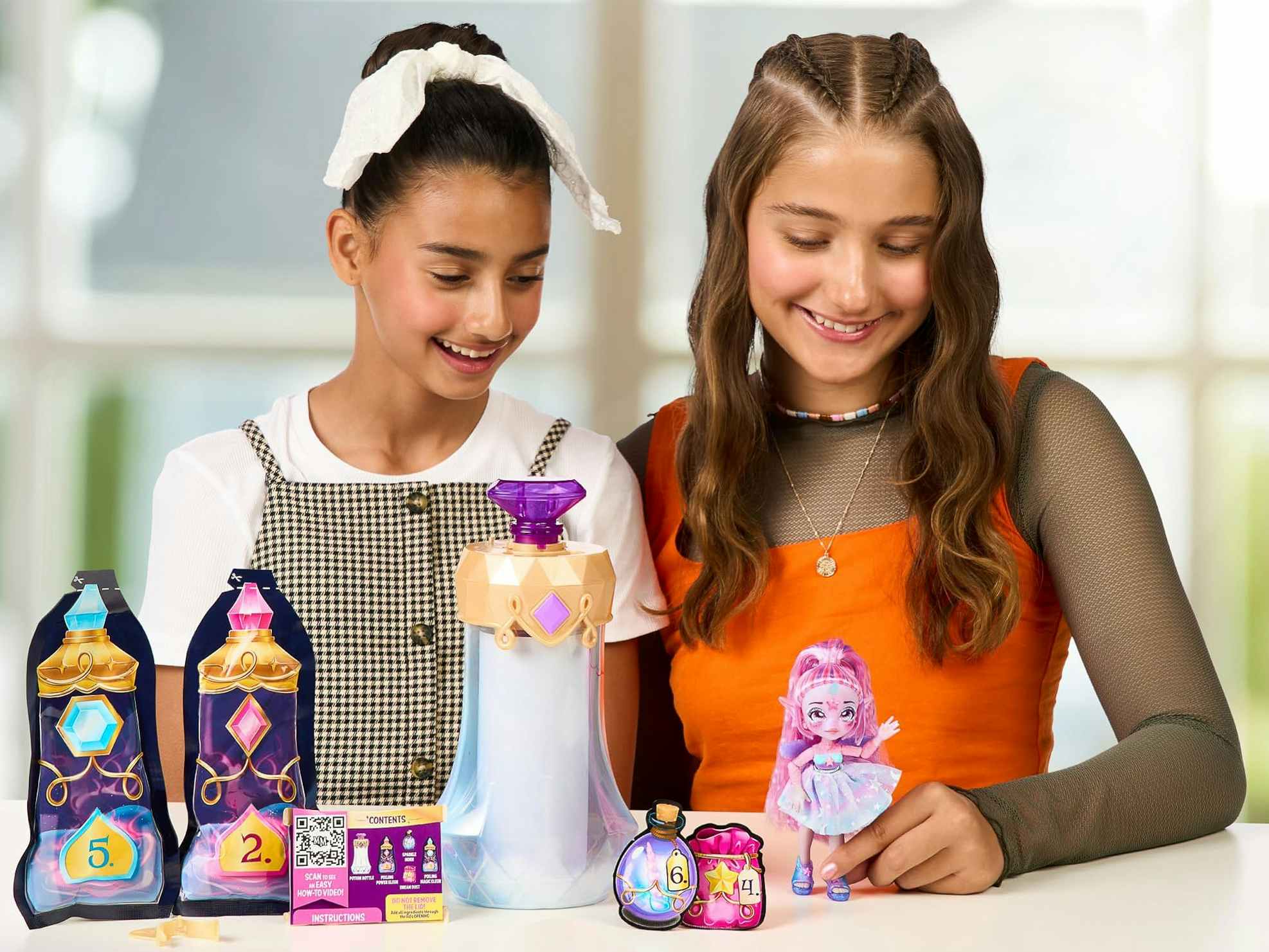 some kids playing with a Magic Mixies Pixling doll