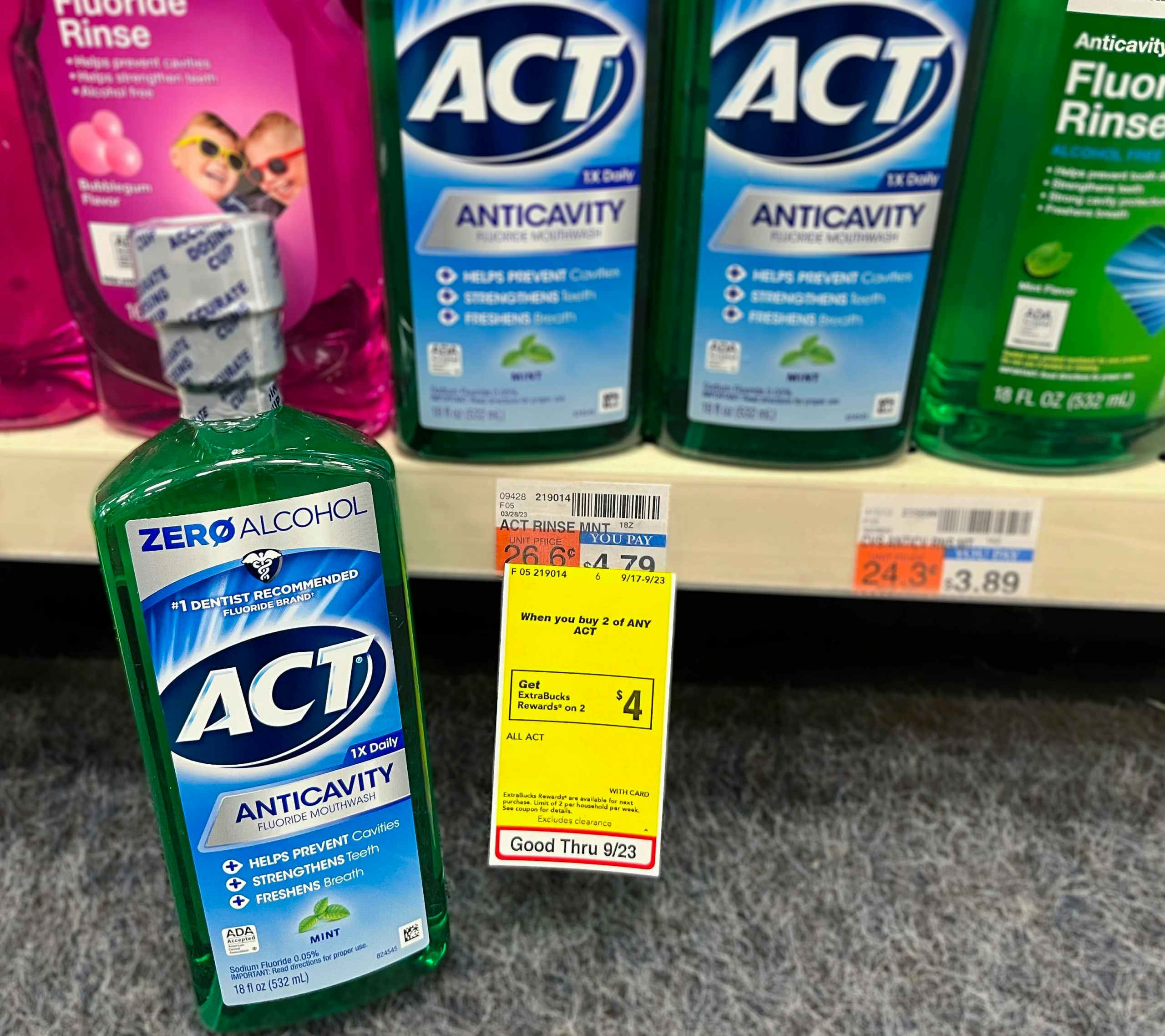 bottle of ACT mouthwash next to sales tag