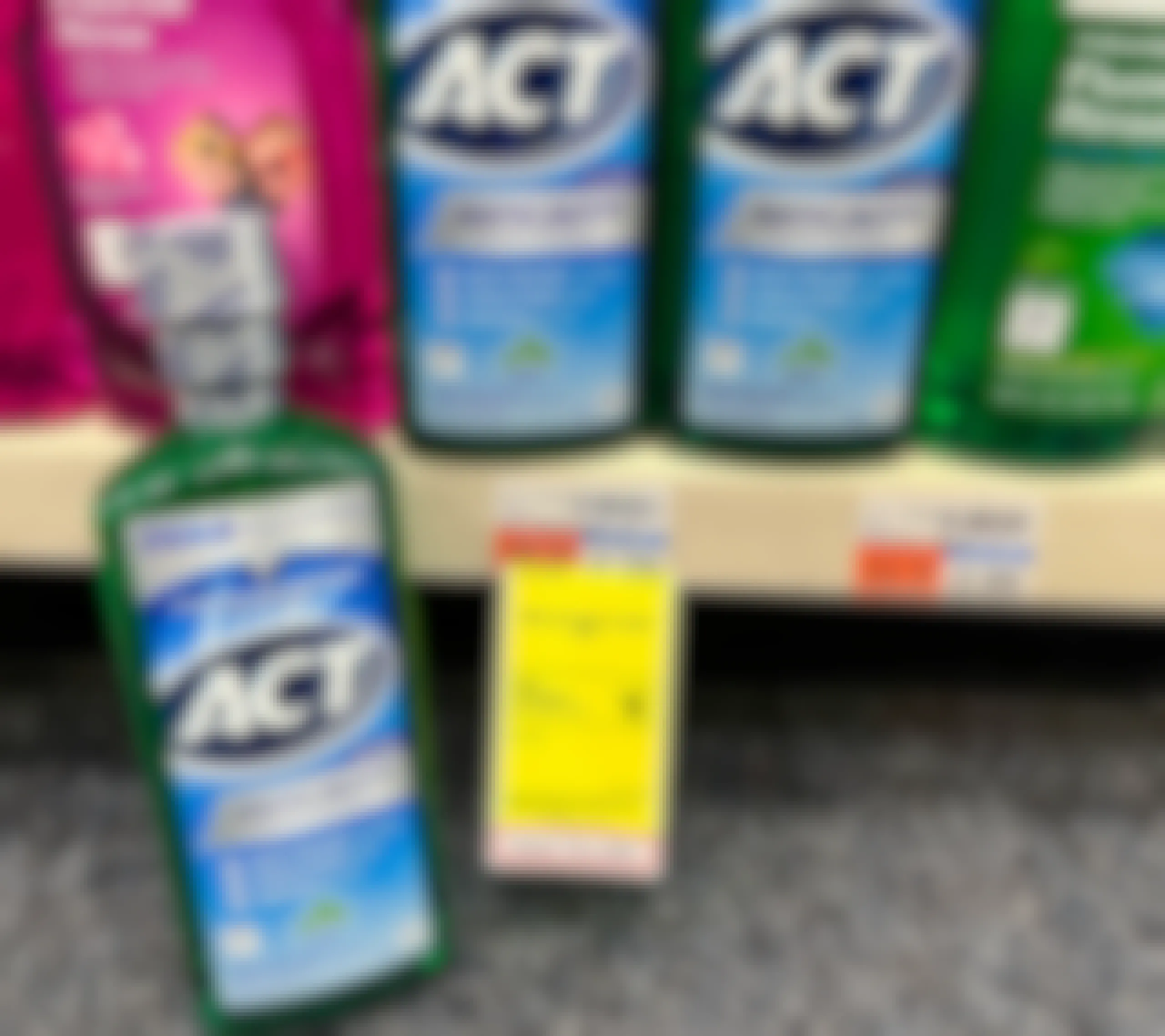 bottle of ACT mouthwash next to sales tag