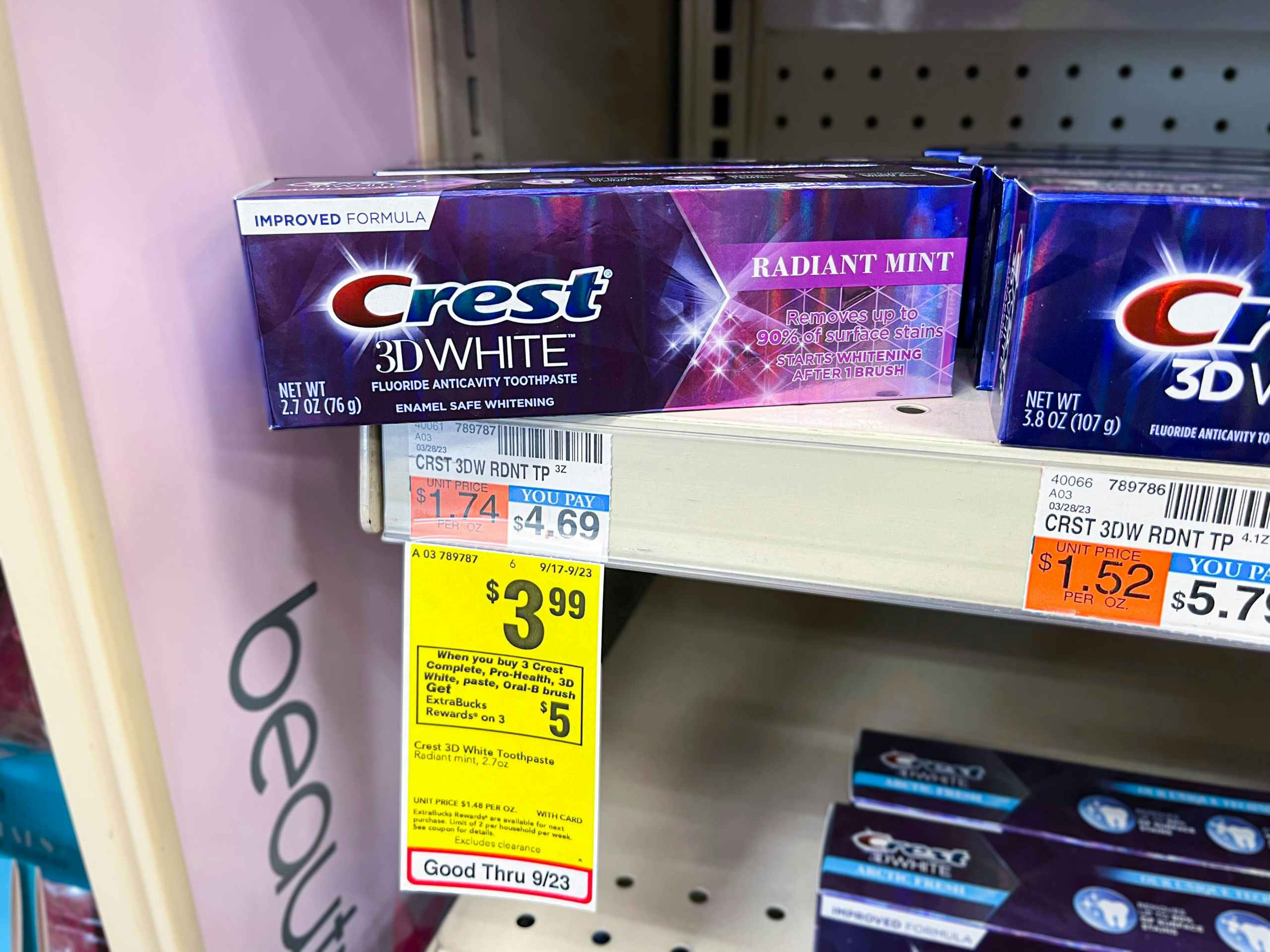 one Crest toothpaste on shelf with $3.99 sales tag underneath