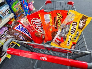 Snickers, Reese's, Kit Kat, and M&M's candy bags