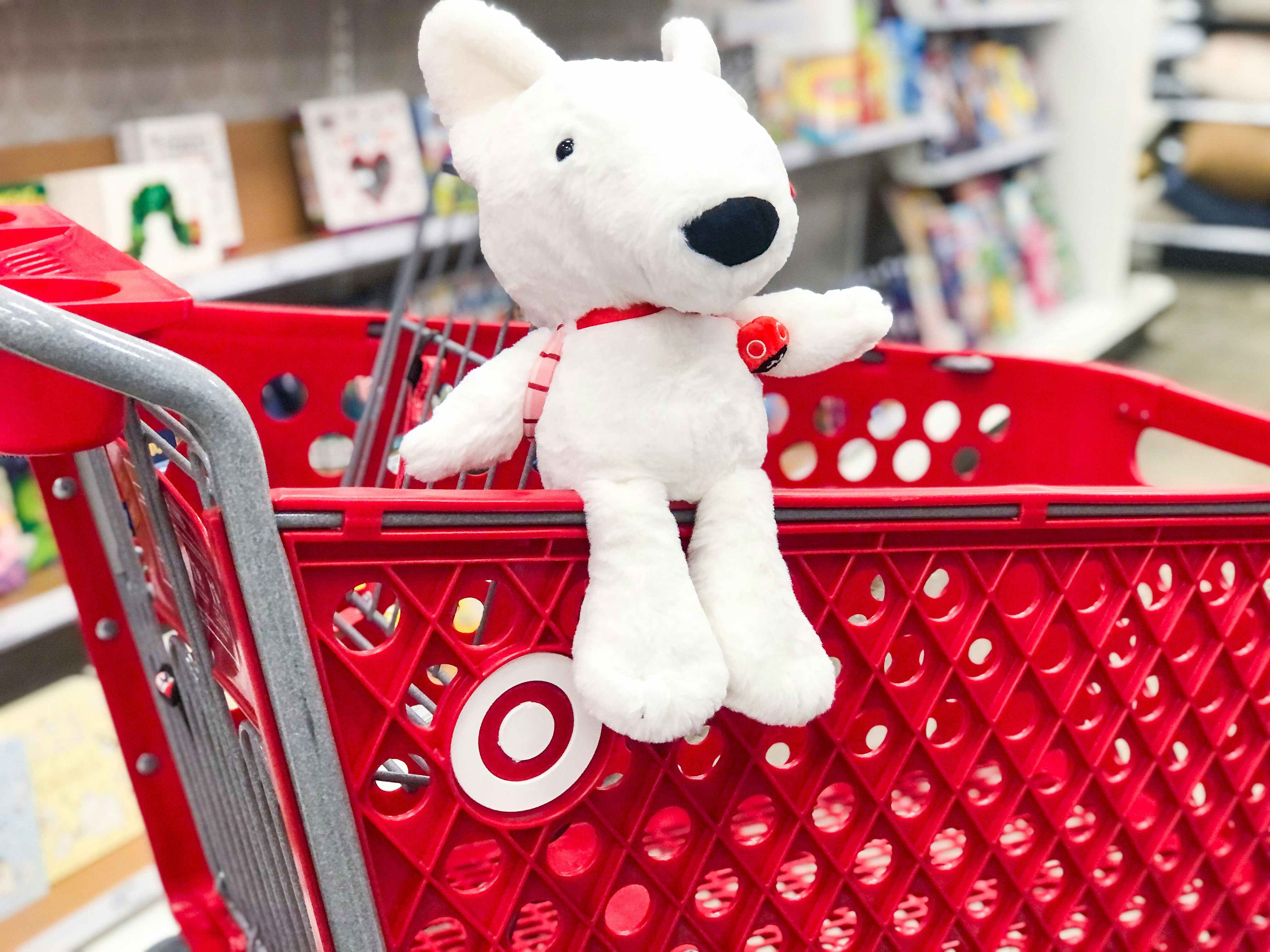 Target plush dog sitting on cart
