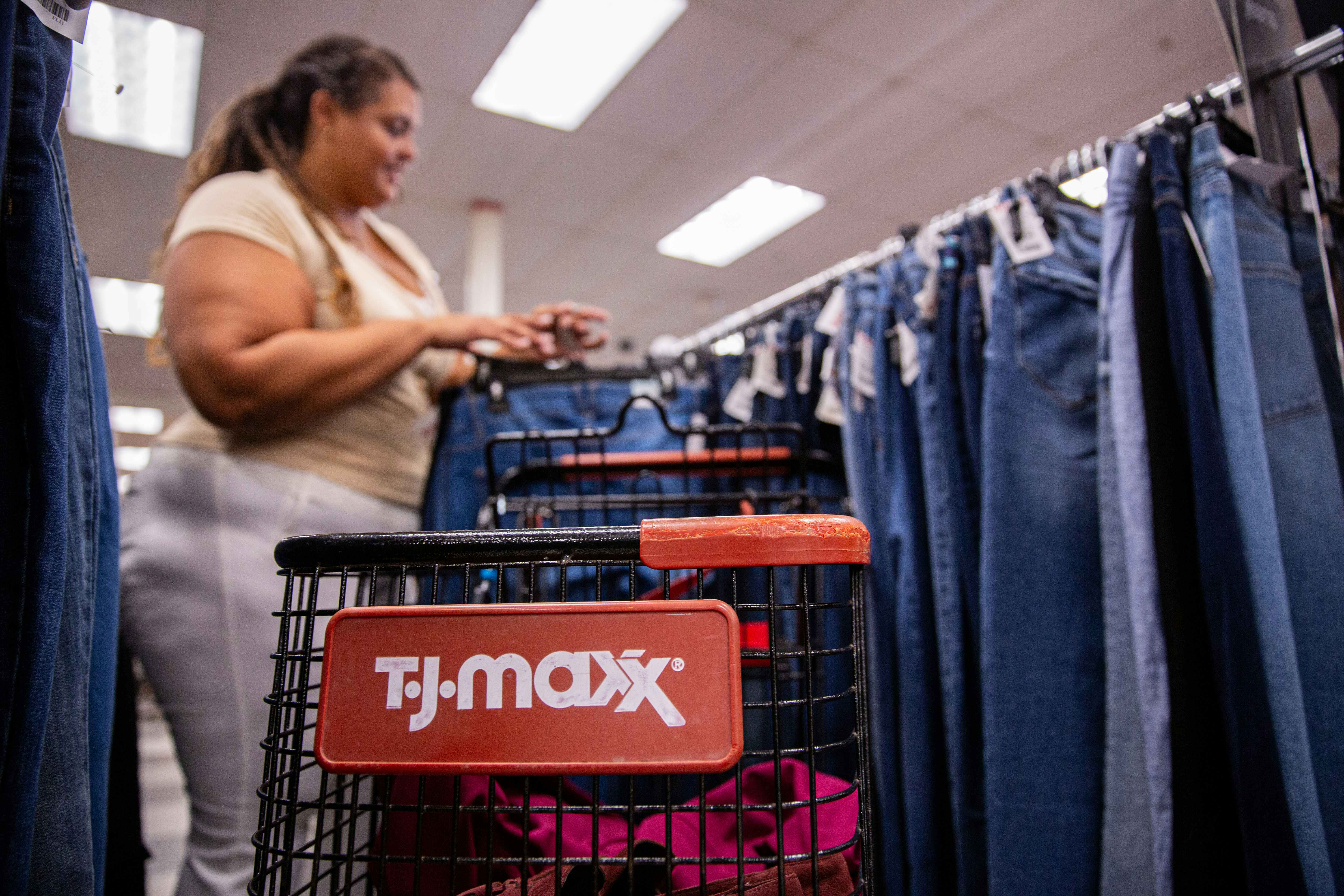 Model shopping for jeans at Tjmaxx