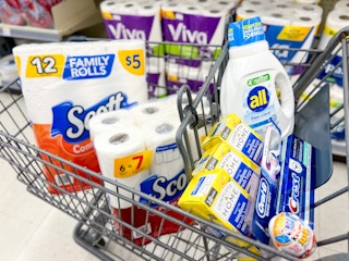 shopping cart in store aisle with shopping haul