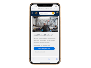 an iphone with the walmart business plus website pulled up on it