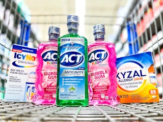 icy hot original, act kids and anticavity outhwash, and xyzal allergy in walmart shopping cart