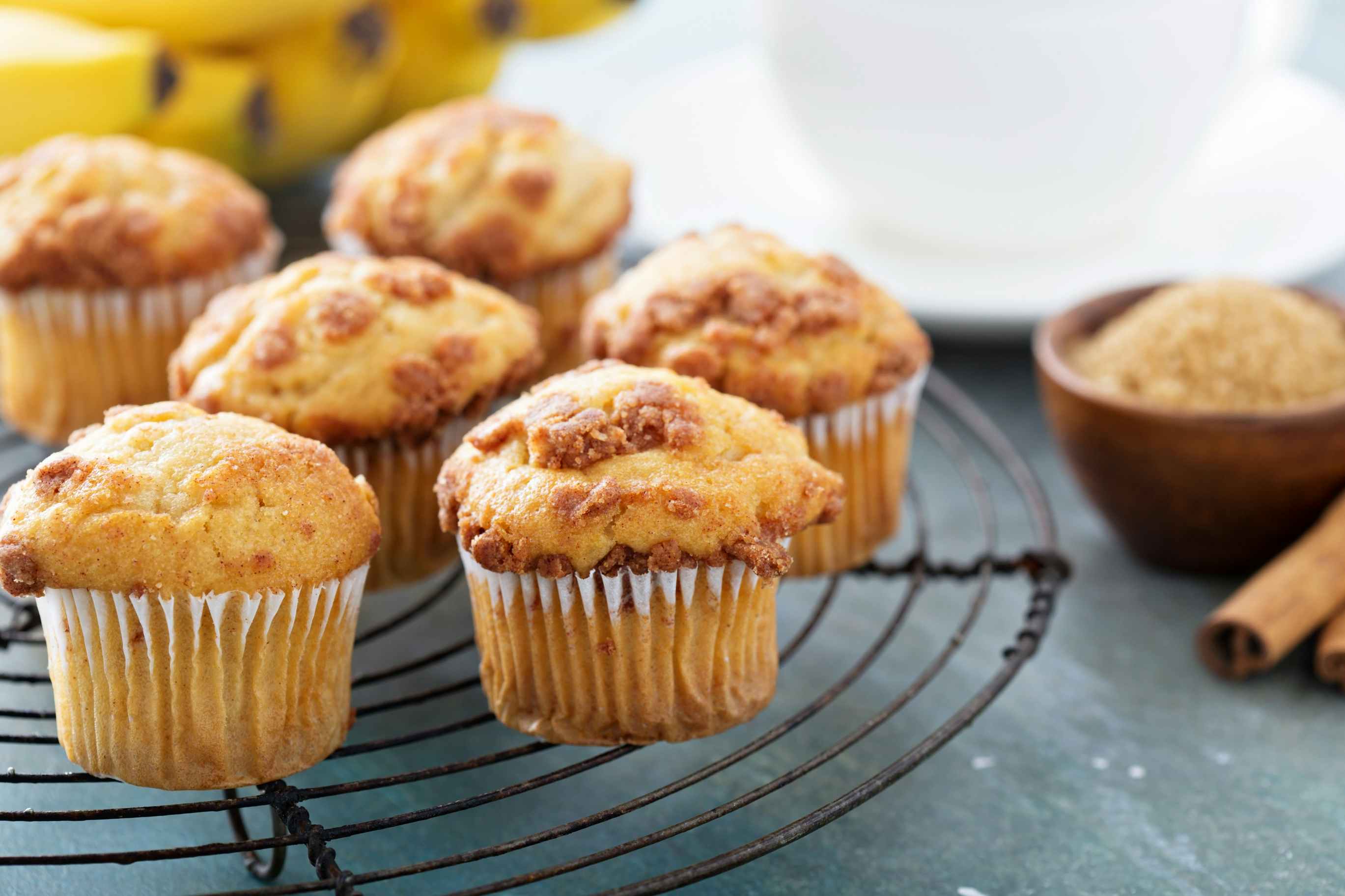 Stack of banana muffins on a cooling rack