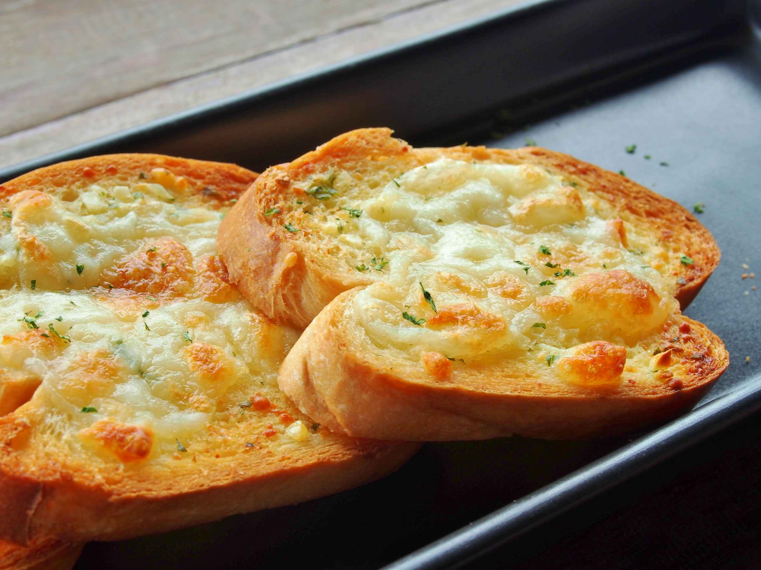 Garlic bread on a metal pan