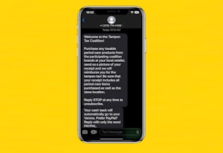 An iphone with the Tampon Tax Coalition text message displayed