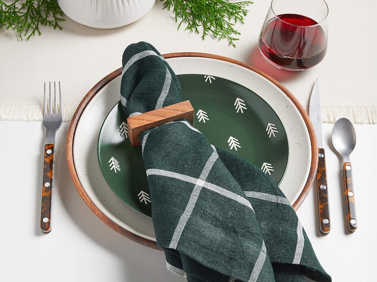 green holiday cloth napkins and place setting at table